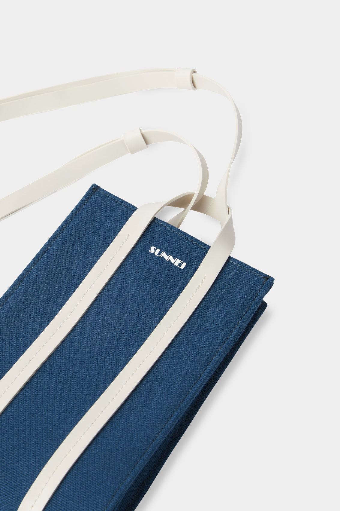PARALLELEPIPEDO MICRO BAG / petrol blue & white – SUNNEI